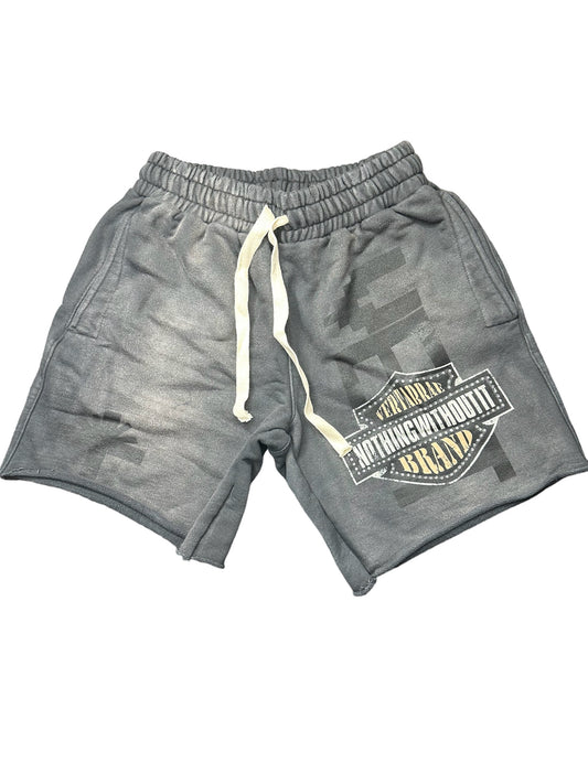 Shorts con emblema de vértebras